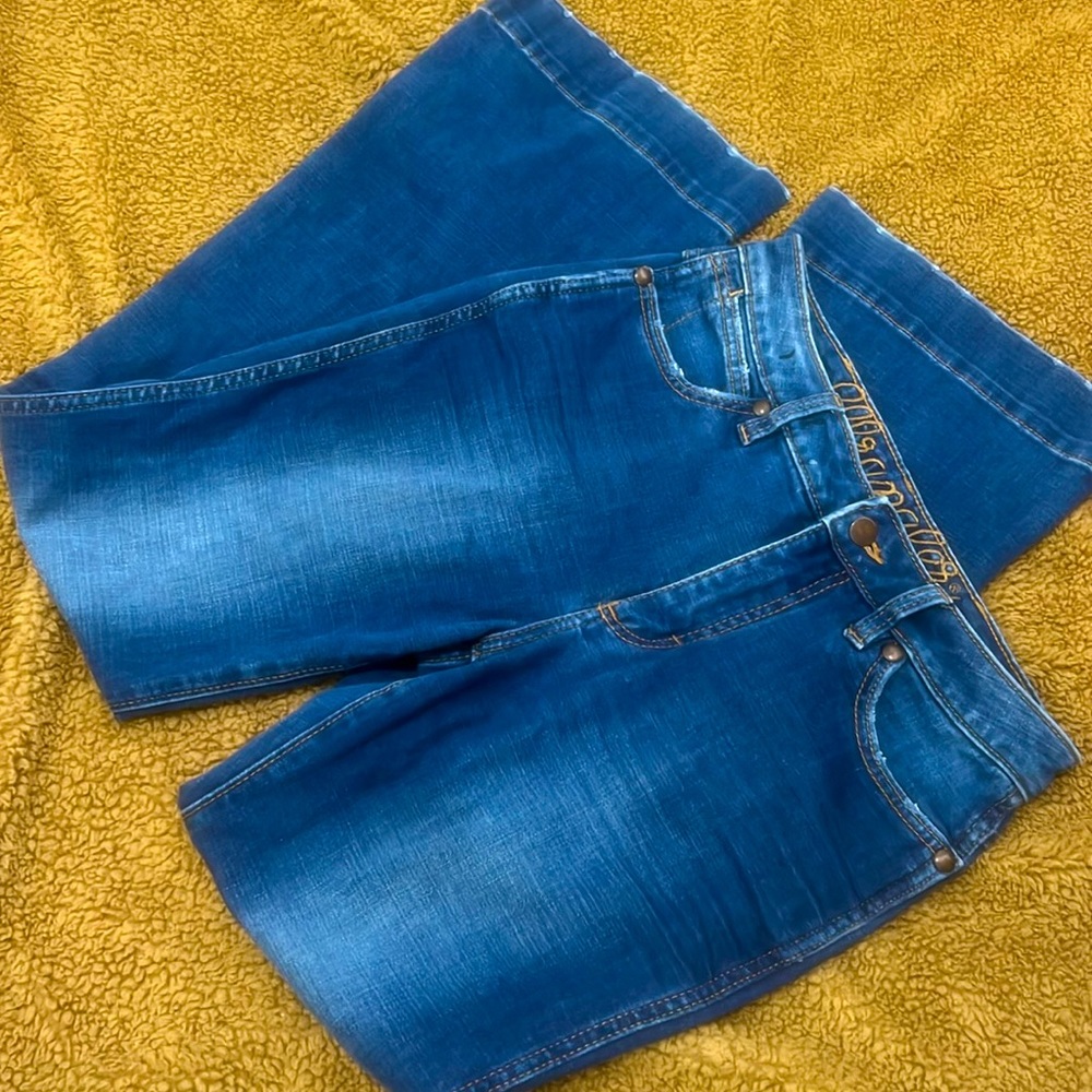WRANGLER Retro High Rise Distressef Blue Jeans in TROUSER BOOT